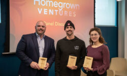 Homegrown Ventures Conference With Speakers Gus Minor, Dylan Lloyd, And Hilary Deverell Holding Plaques